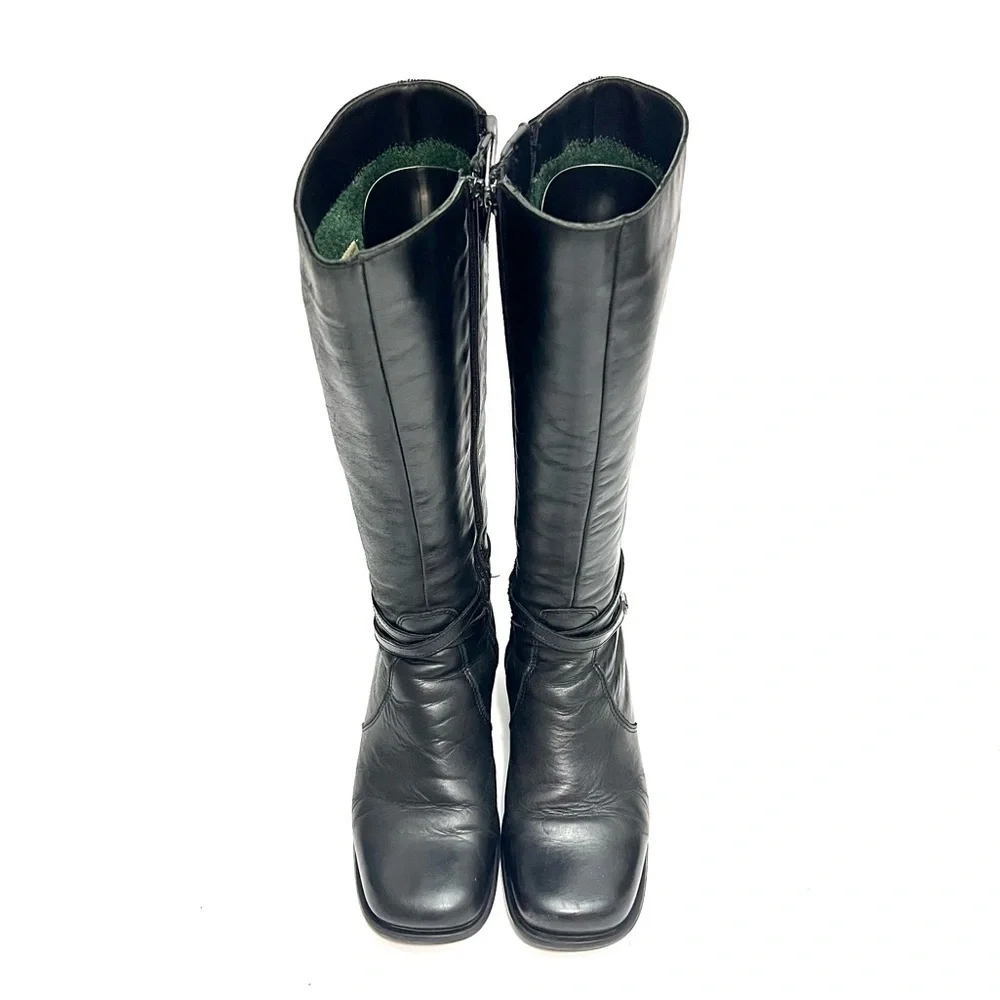 Vintage 1990s black leather knee high wool lined heeled winter fashion boots